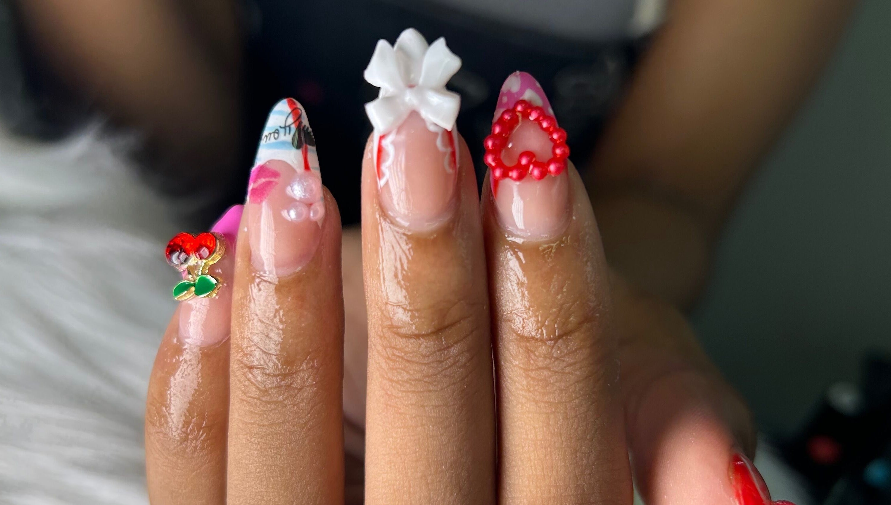 Unique nail designs with embellishments at She Buffed It, Nassau, New Providence, BS.