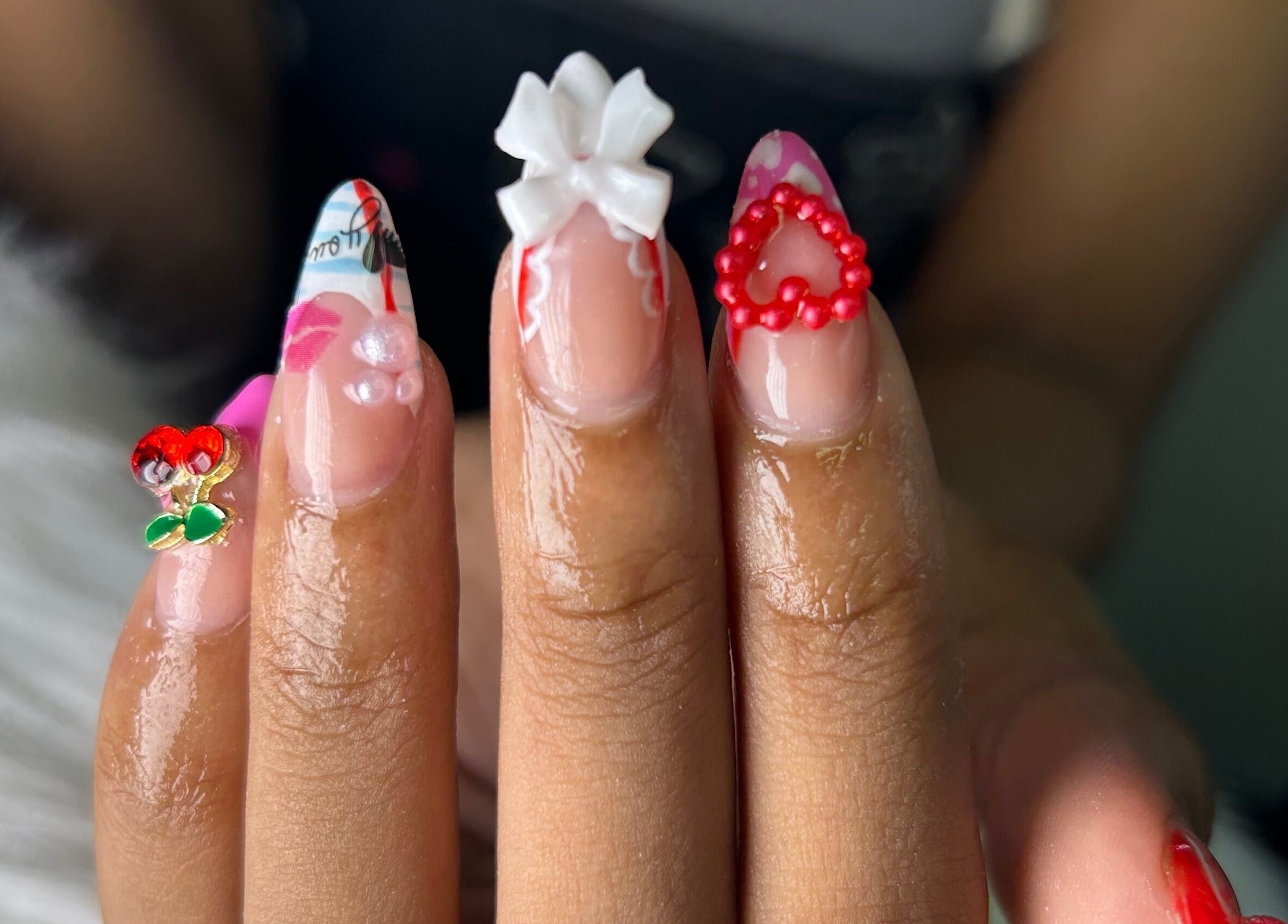 Unique nail designs with embellishments at She Buffed It, Nassau, New Providence, BS.