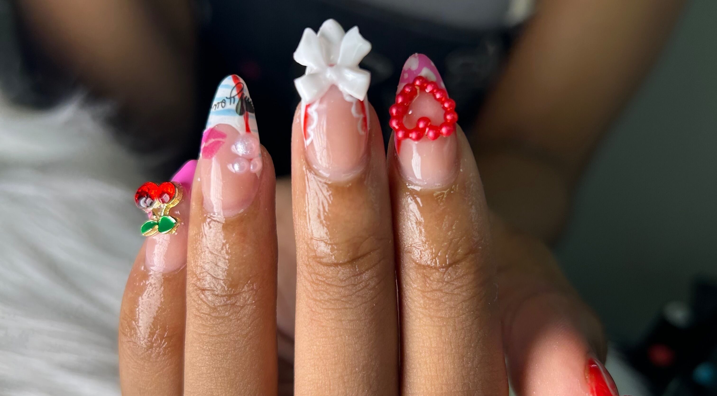 Unique nail designs with embellishments at She Buffed It, Nassau, New Providence, BS.