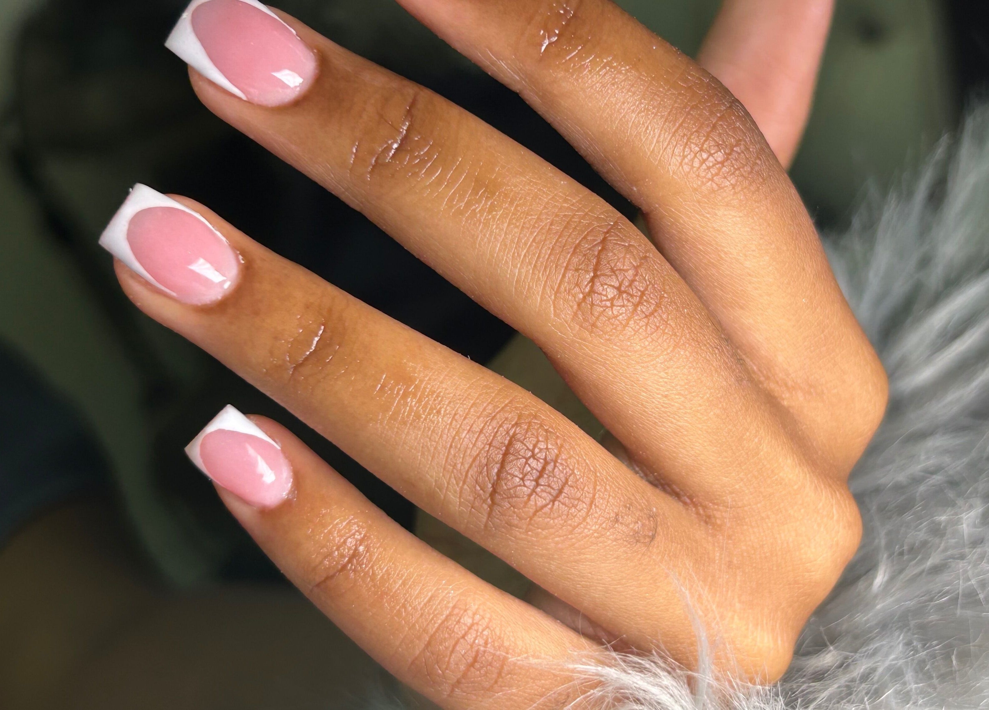 Stylish pink and white nail design at She Buffed It, Nassau, New Providence, BS.