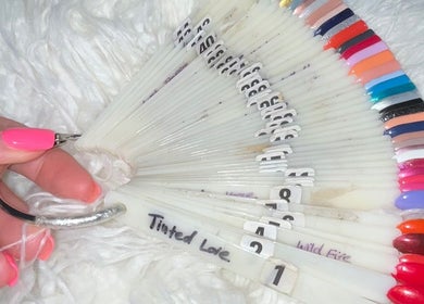 Variety of nail polish samples on ring at Venus Vegan, London, England, GB for color selection.