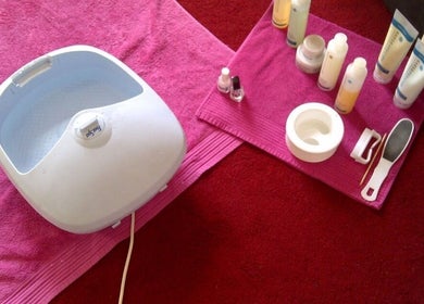 Foot spa and beauty products at Venus Vegan, London, England, GB, symbolizing relaxation and care.