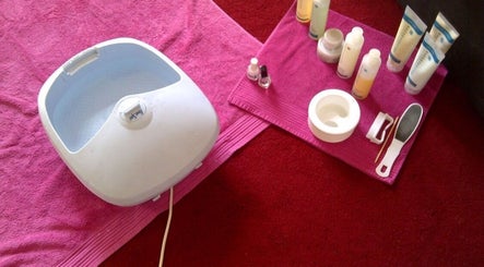 Foot spa and beauty products at Venus Vegan, London, England, GB, symbolizing relaxation and care.
