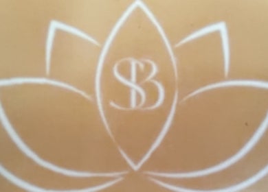 Sophistication Beauty logo featuring lotus design in Grantham, England, GB.