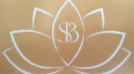 Sophistication Beauty logo featuring lotus design in Grantham, England, GB.