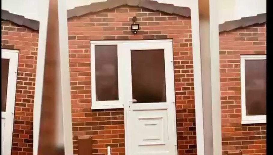 Front view of Annie's Reiki & Massage Therapy entrance in Knottingley, England, GB with red brick façade.