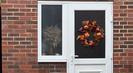 Entrance of Annies Reiki & Massage Therapy with an autumn wreath, Knottingley, England, GB.