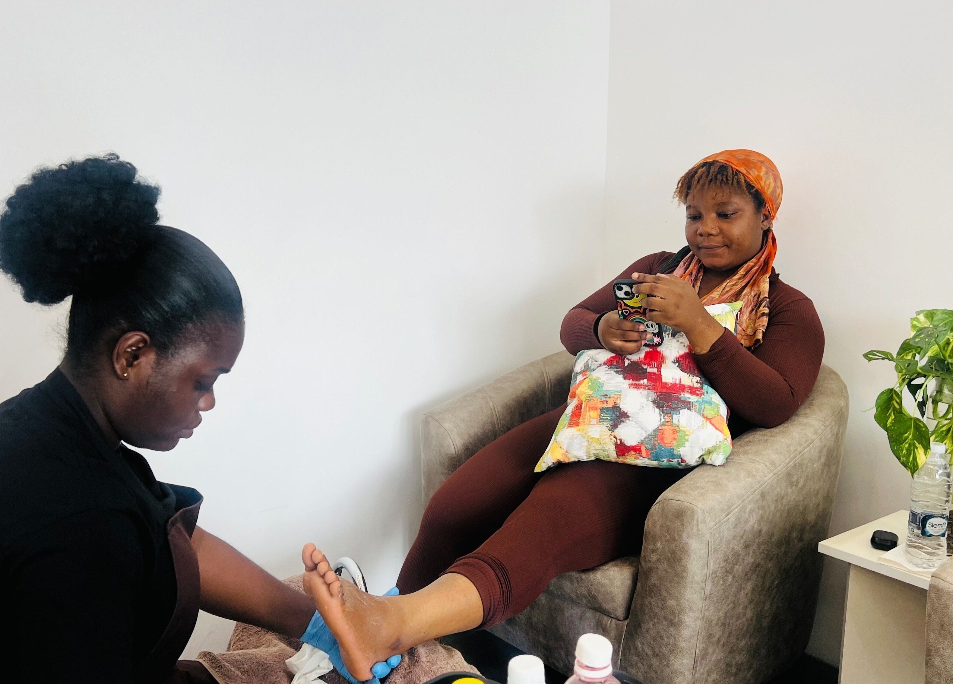 Woman enjoying a pedicure at Ronexe Beauty Hub in Greater Accra Region, GH.