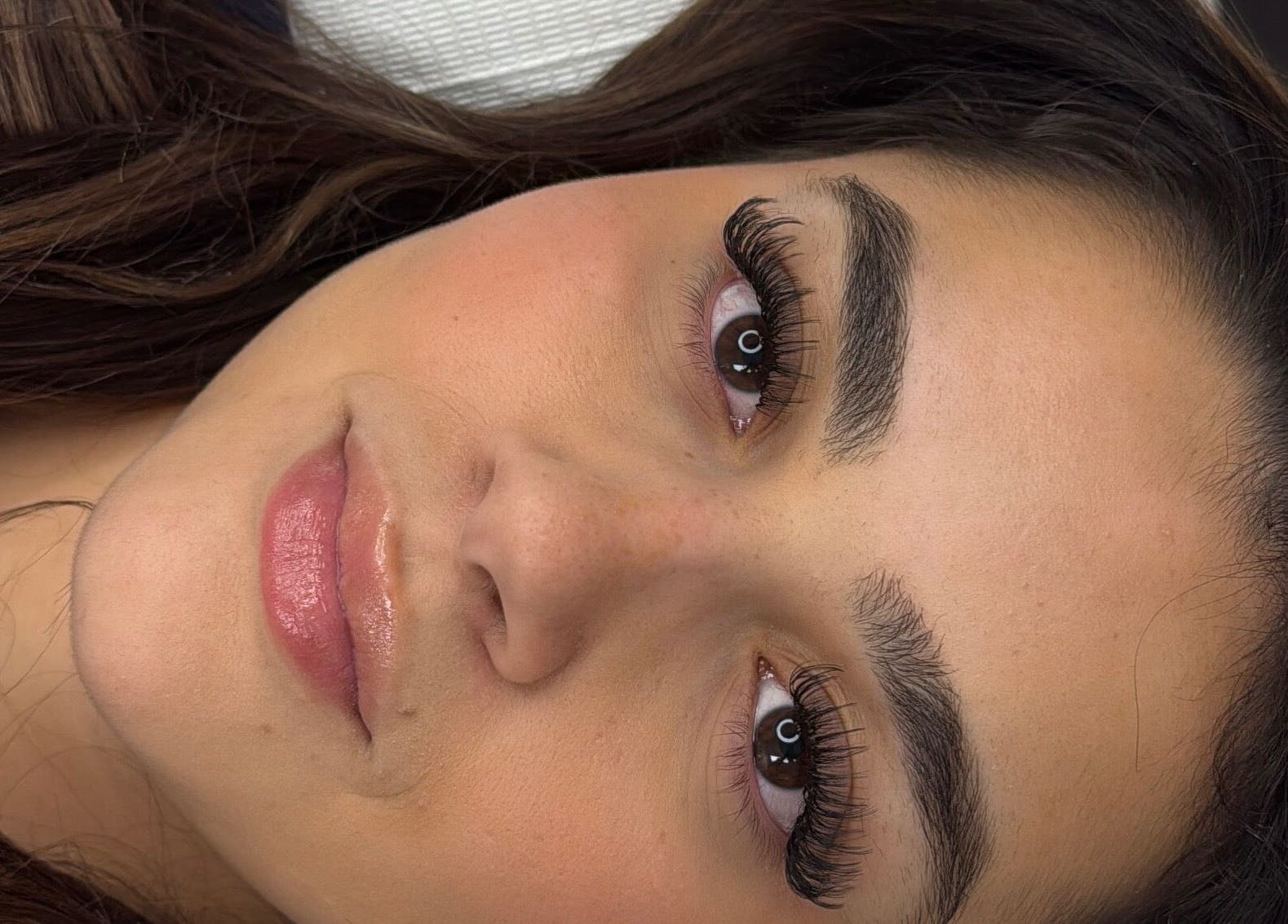 Close-up of expertly applied eyelash extensions at Lashes By Alex in Laval, Québec, CA.