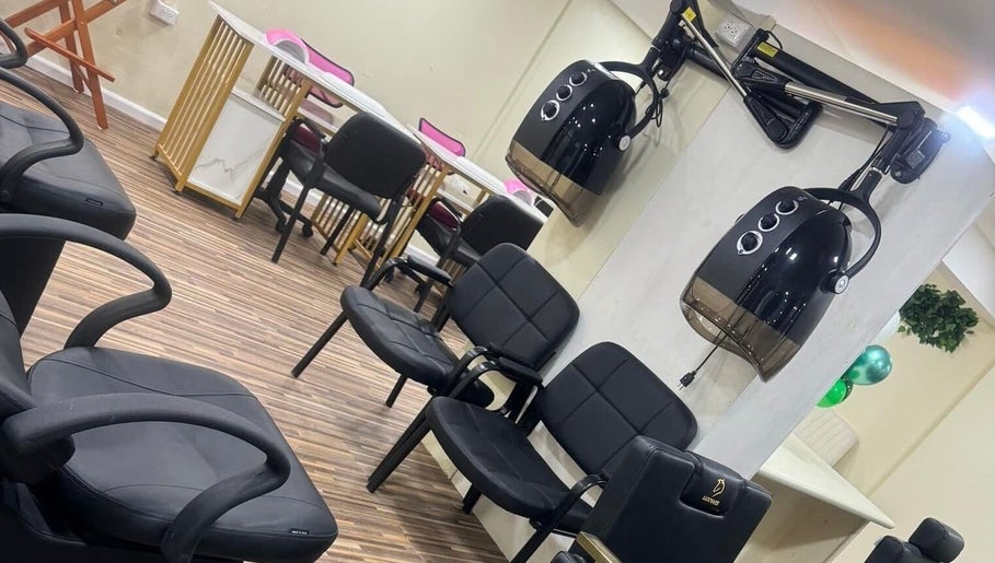 Chic salon interior with styling chairs and equipment at Xtra Touch Oasis, Scarborough, Tobago, TT.