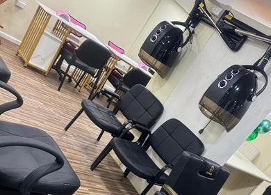 Chic salon interior with styling chairs and equipment at Xtra Touch Oasis, Scarborough, Tobago, TT.