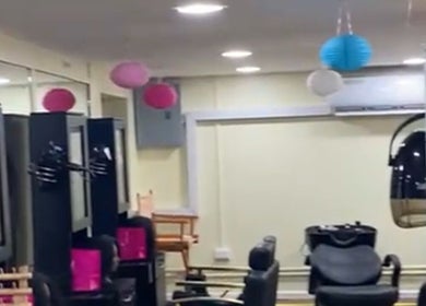 Modern salon chairs and decor at Xtra Touch Oasis, Scarborough, Tobago, TT enhancing a stylish ambiance.