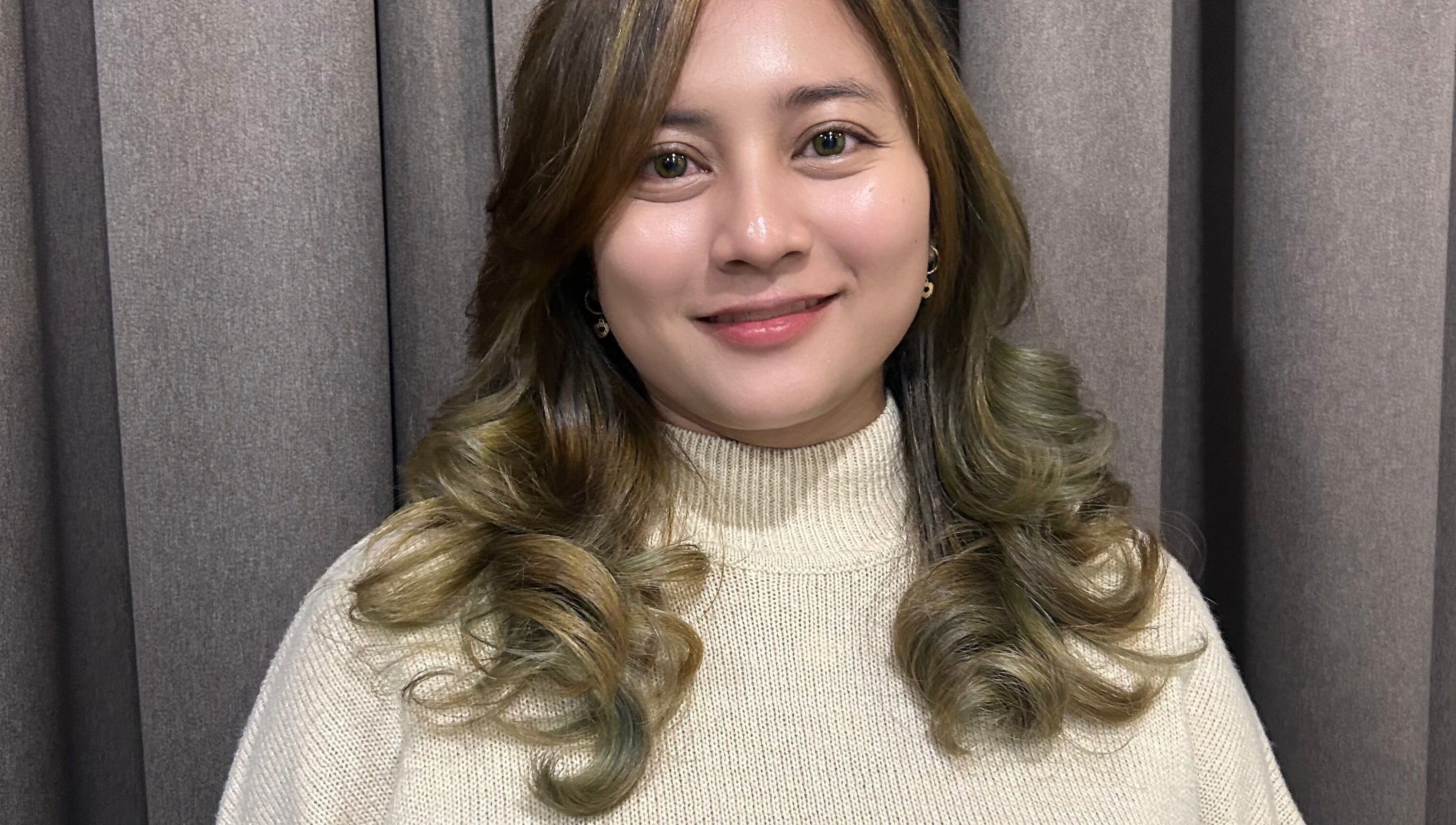 Woman with elegant curls at Teera Hair Touch, Petaling Jaya, Selangor, MY.