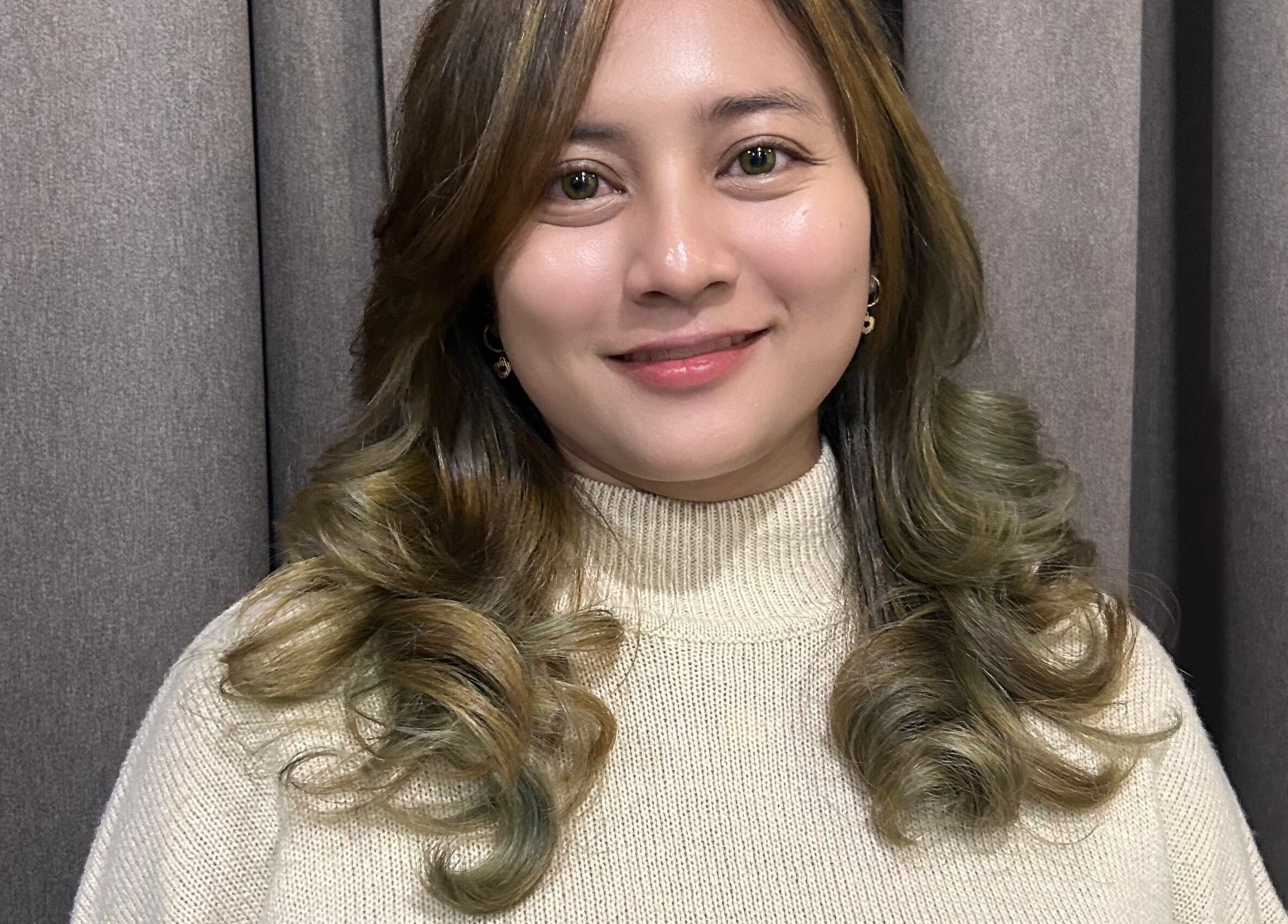 Woman with elegant curls at Teera Hair Touch, Petaling Jaya, Selangor, MY.