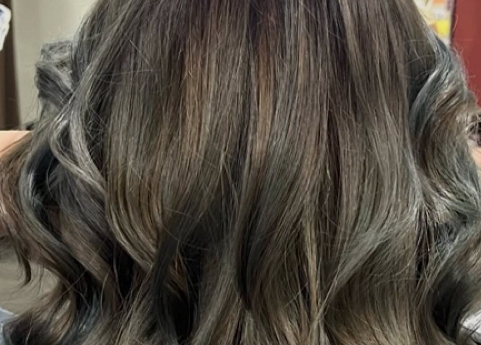 Stylish wavy hair at Teera Hair Touch, Petaling Jaya, Selangor, MY, showcasing professional styling.