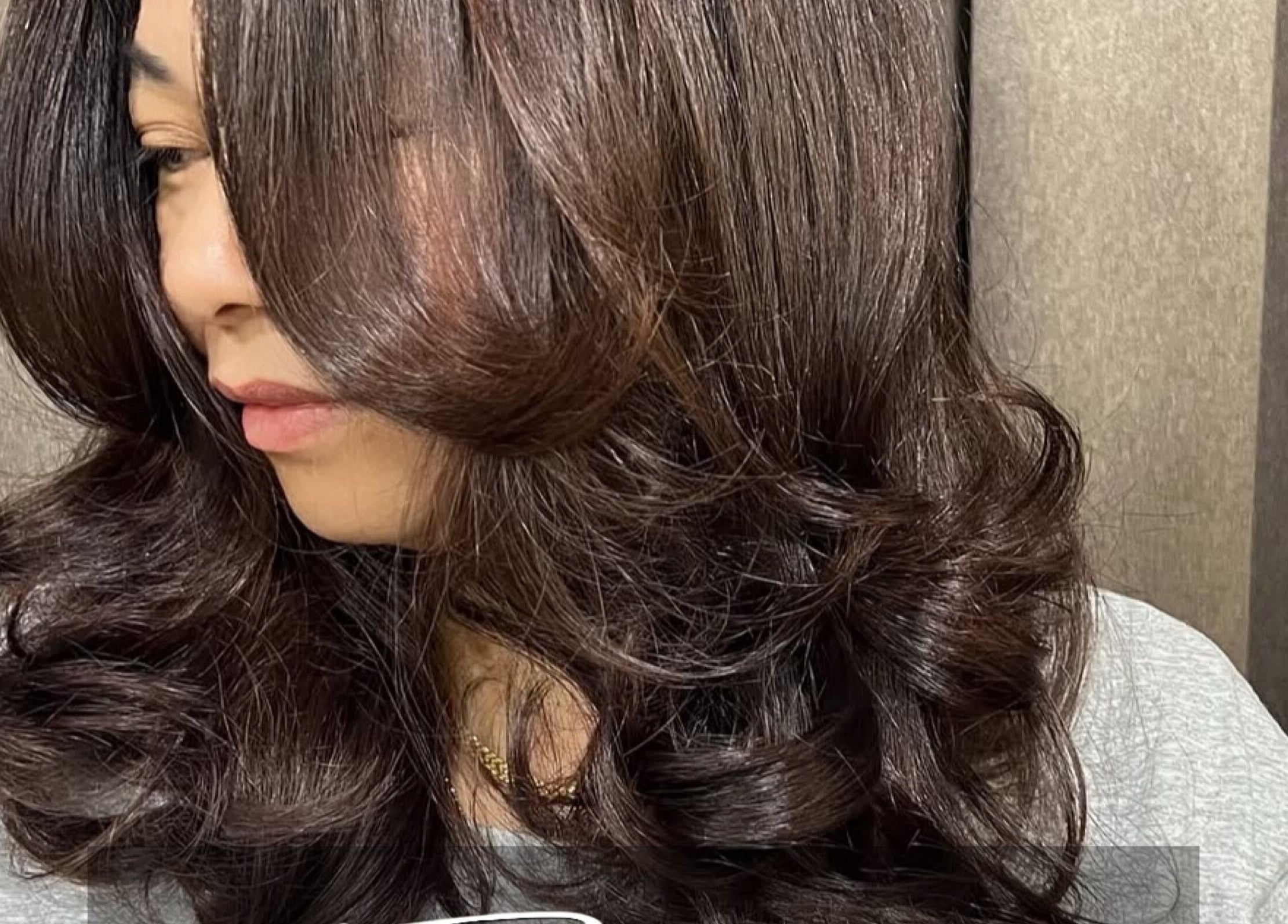 Elegant wavy hairstyle at Teera Hair Touch, Petaling Jaya, Selangor, MY. Perfect for any occasion.