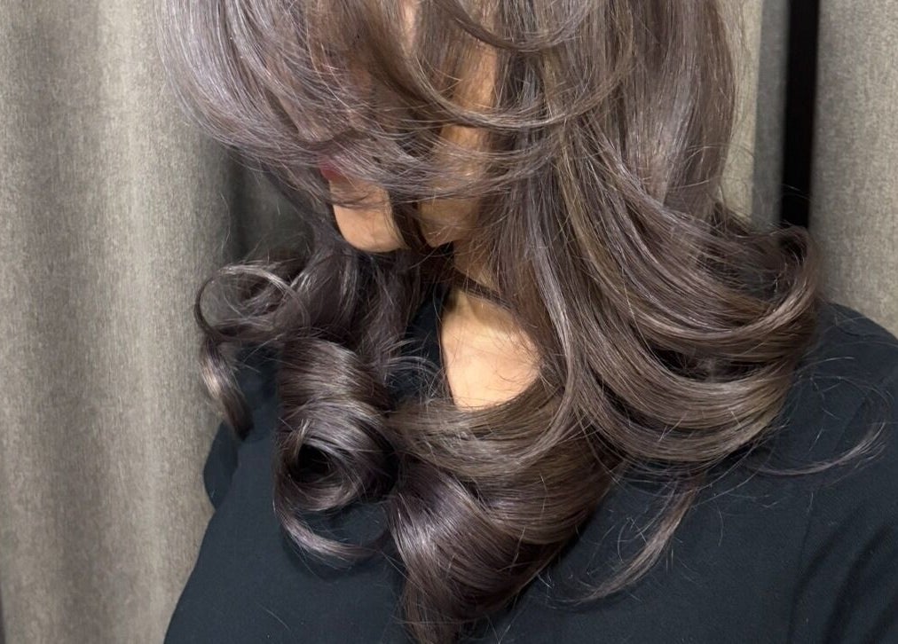 Styled brunette curls at Teera Hair Touch in Petaling Jaya, Selangor, MY.
