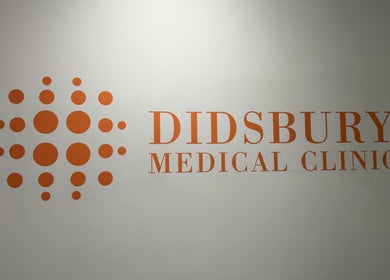 Didsbury Medical Clinic logo on wall, Manchester, England, GB.