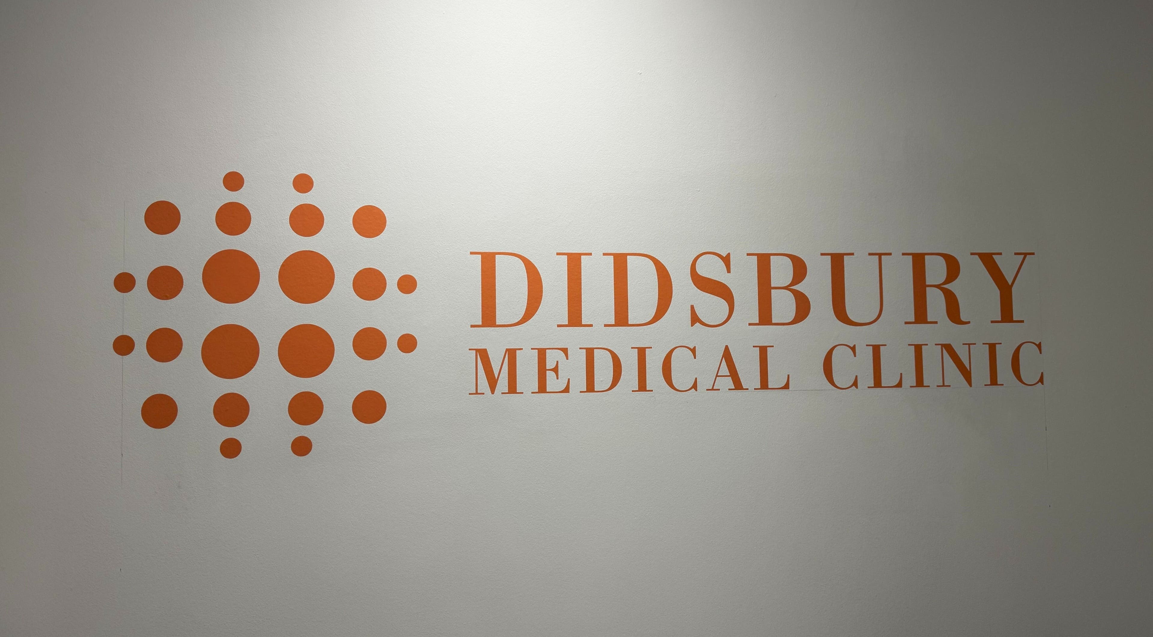 Didsbury Medical Clinic logo on wall, Manchester, England, GB.