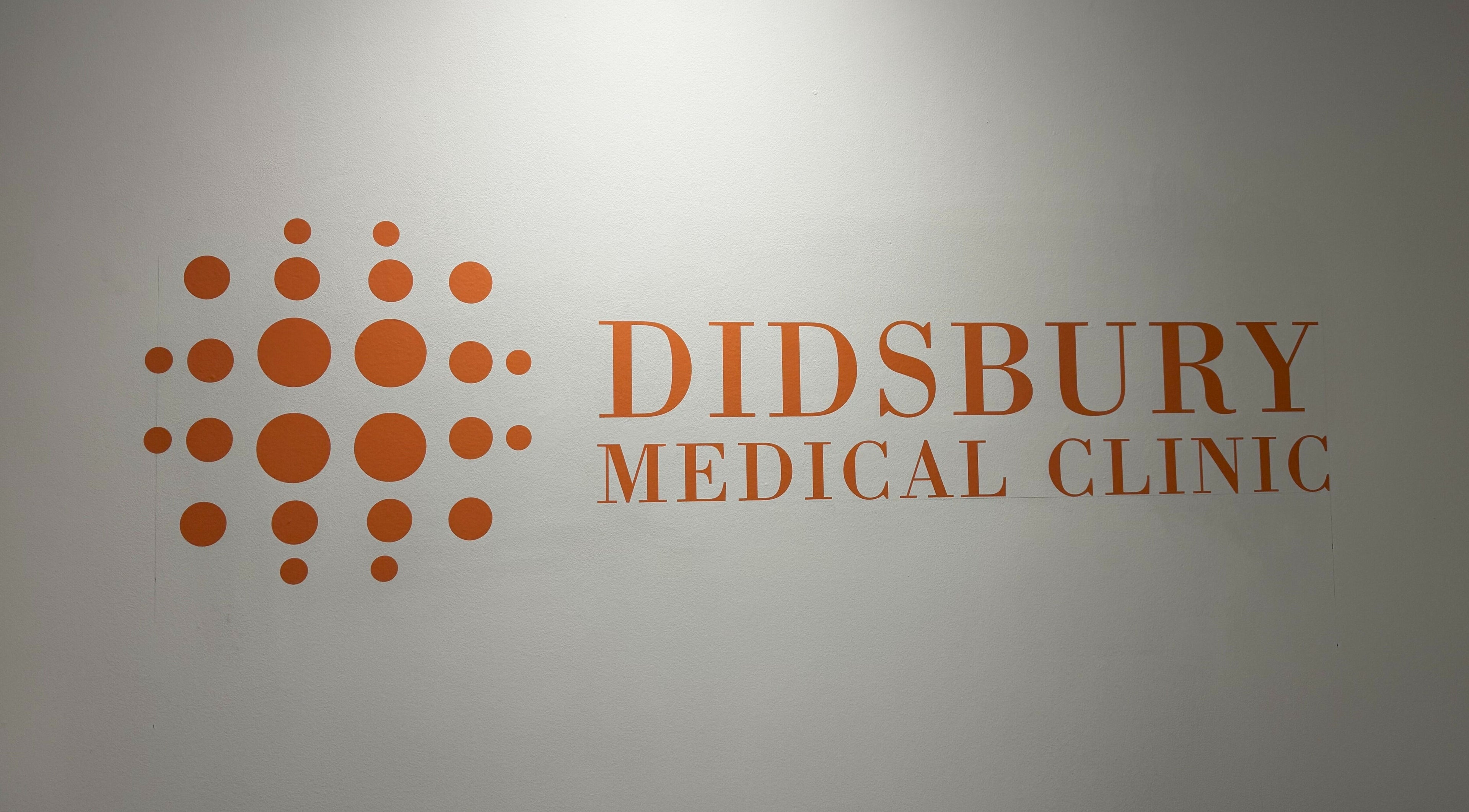 Didsbury Medical Clinic logo on wall, Manchester, England, GB.
