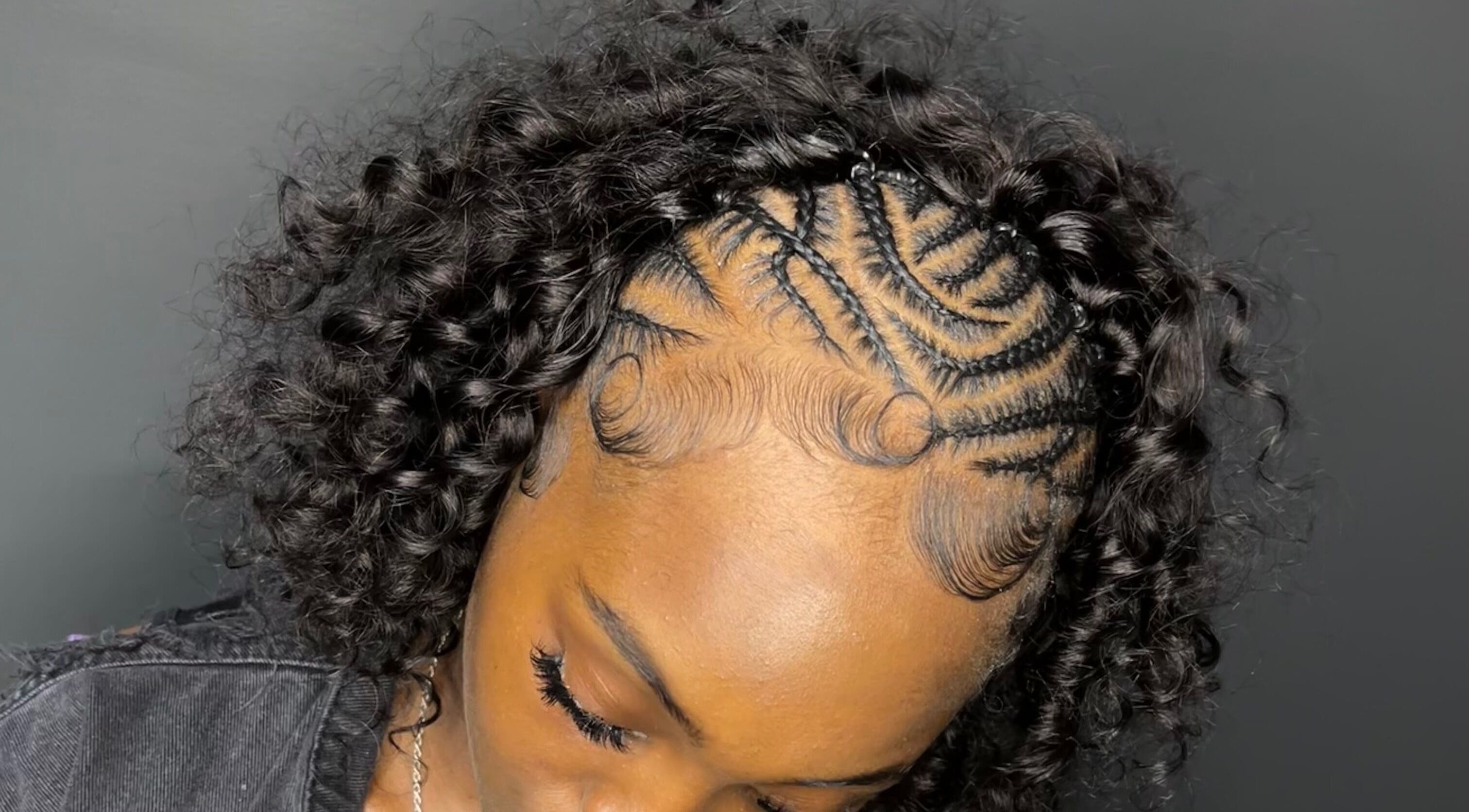 Stylish braided hairstyle at Keedahairjunkie, Forney, Texas, US, showcasing intricate patterns.