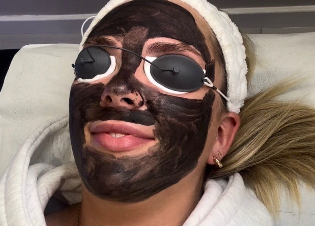 Client enjoying a rejuvenating mask at Radiance Laser Studio, Aberdeen, Scotland, GB.