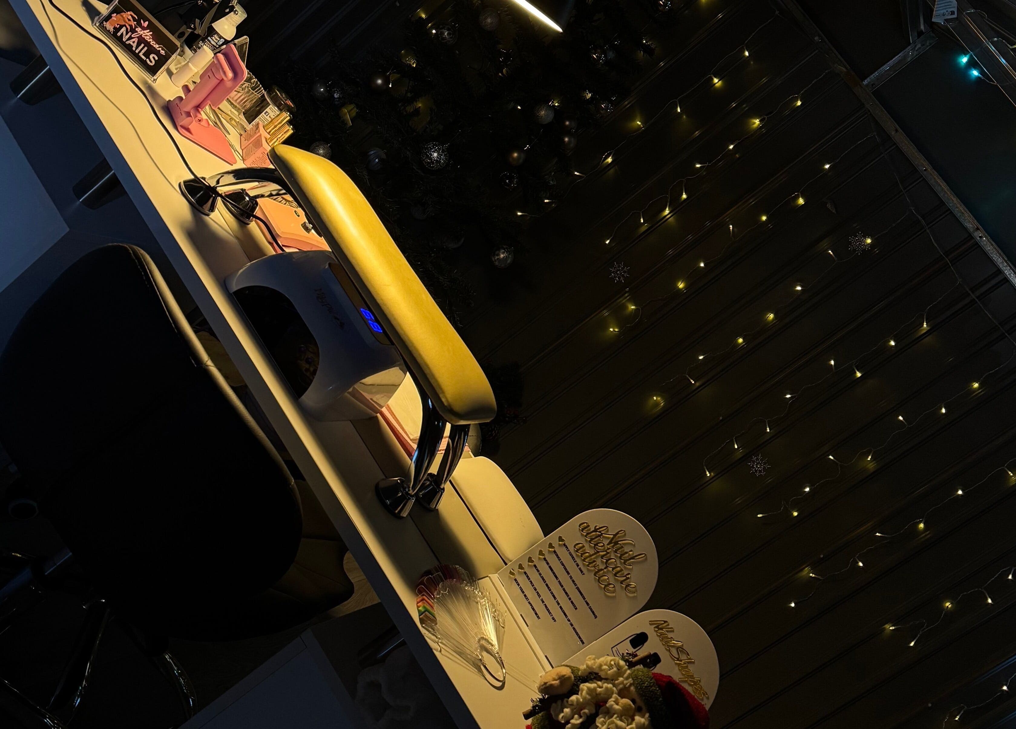 Ambersbeautyx nail station with warm lights and tools in Stoke-on-Trent, England, GB.