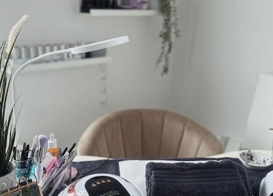 Manicure setup at Bloom Beauty on The Quays, Salford, England, GB, featuring tools and a modern chair.