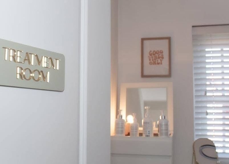 Treatment room at Radiant Skin By KB in Rhyl, Wales, GB with calming decor and skincare products.