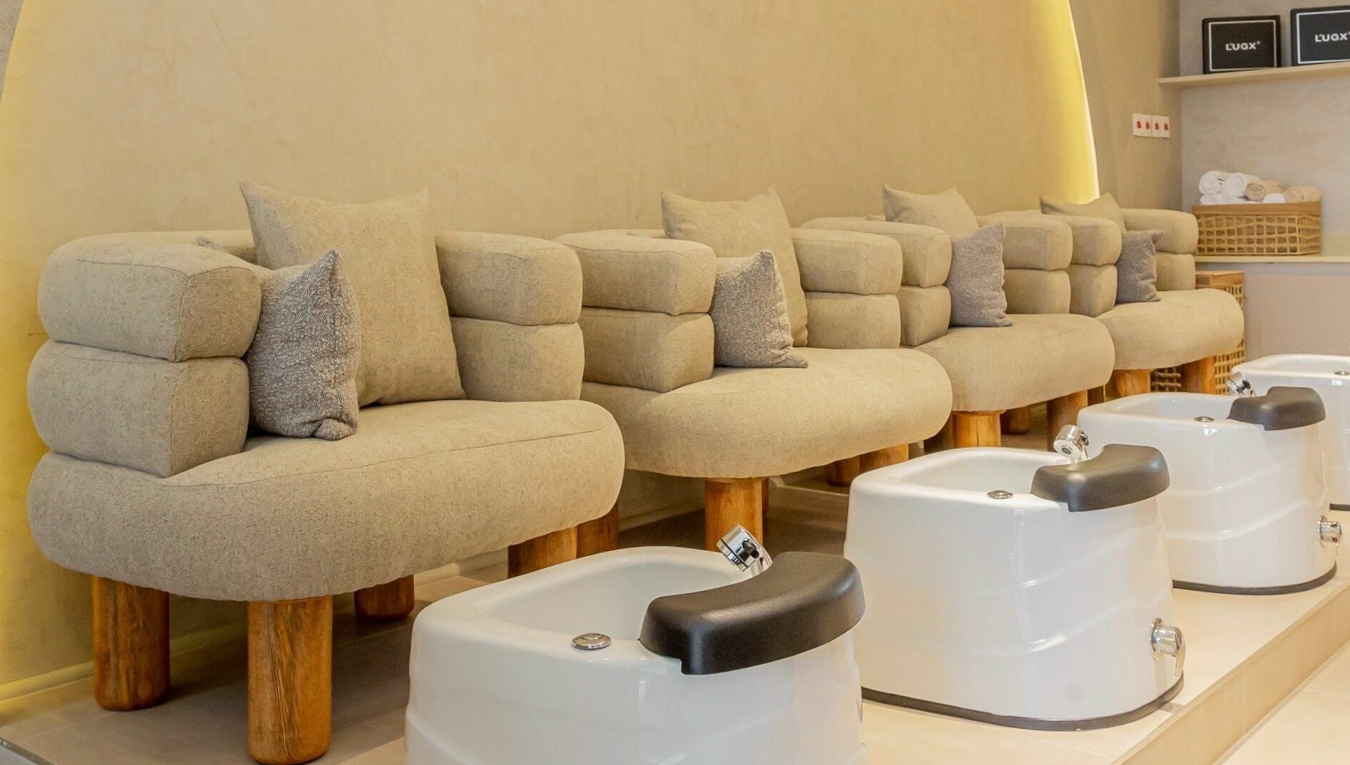 Elegant pedicure chairs at Nuba Spa, Nairobi, Nairobi County, KE, inviting relaxation and comfort.