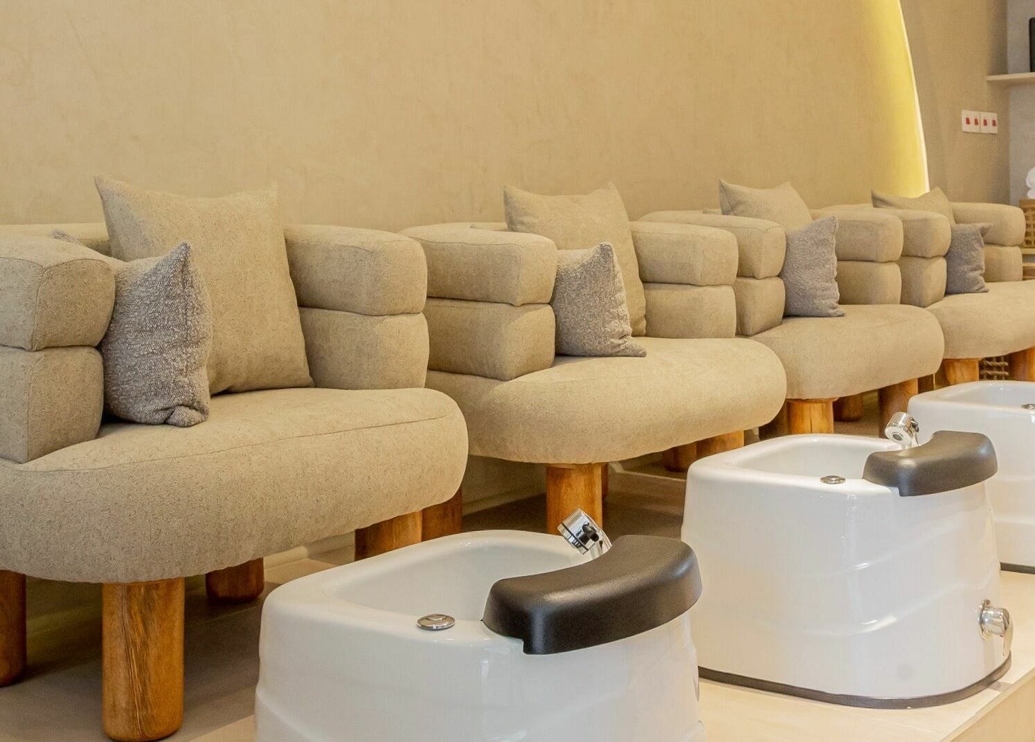 Elegant pedicure chairs at Nuba Spa, Nairobi, Nairobi County, KE, inviting relaxation and comfort.