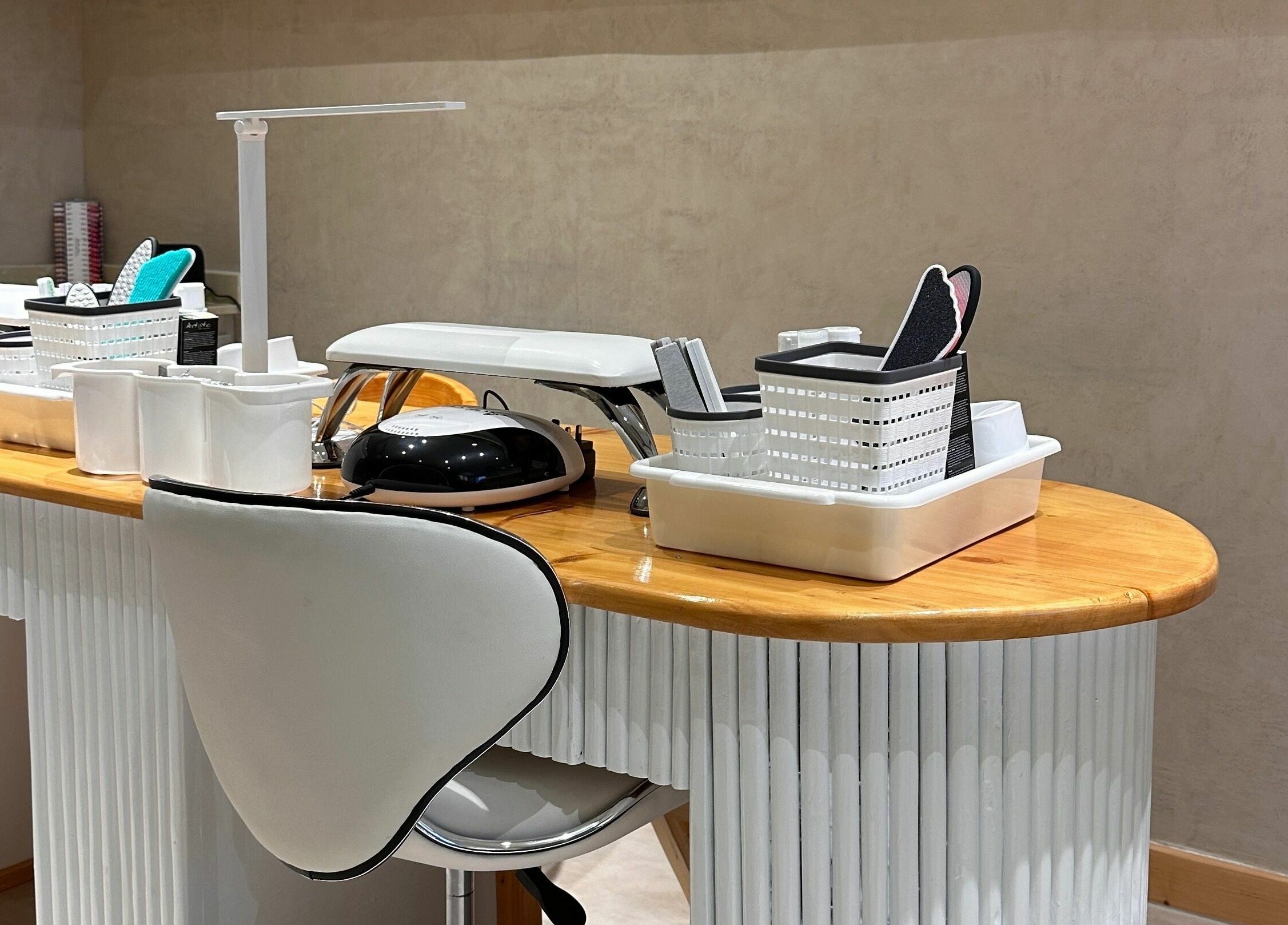 Manicure station at Nuba Spa in Nairobi, Nairobi County, KE, featuring modern tools and sleek design.