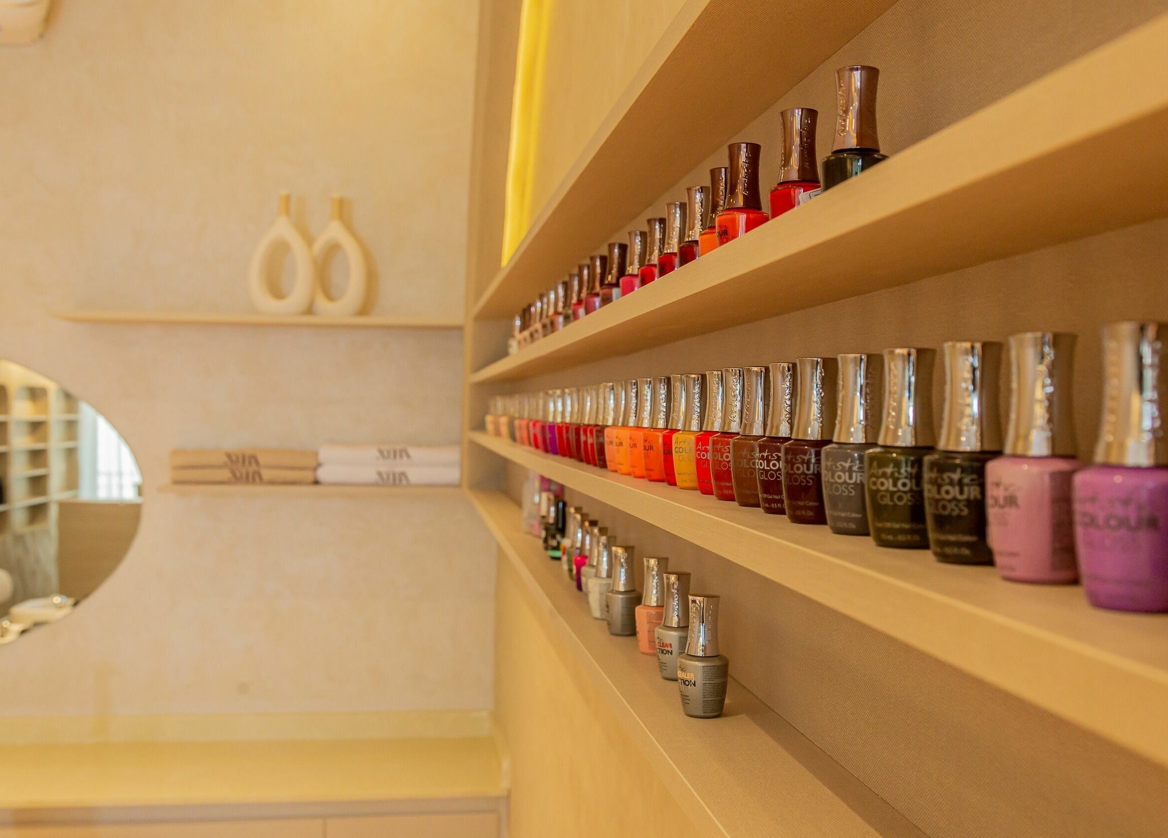 Nail polish display at Nuba Spa, Nairobi, Nairobi County, KE showcases a vibrant color selection.
