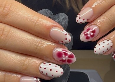 Elegant floral and dot nail art at Polished by Libs, Beckingham, England, GB. Perfect for stylish manicures.