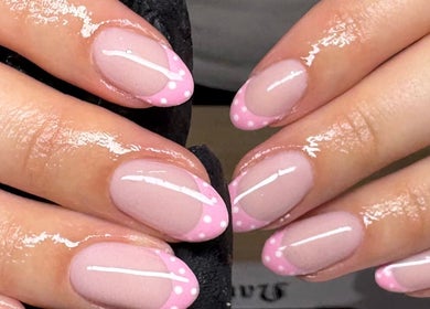 Stylish pink polka dot manicure at Polished by Libs, Beckingham, England, GB.