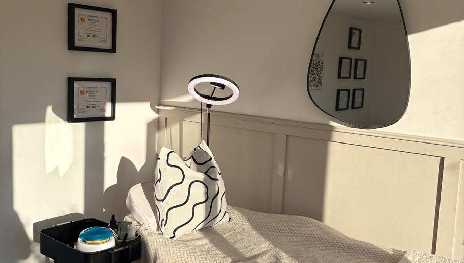 Relaxing treatment room at Polished by Libs, Beckingham, England, GB with cozy blanket and aesthetic decor.