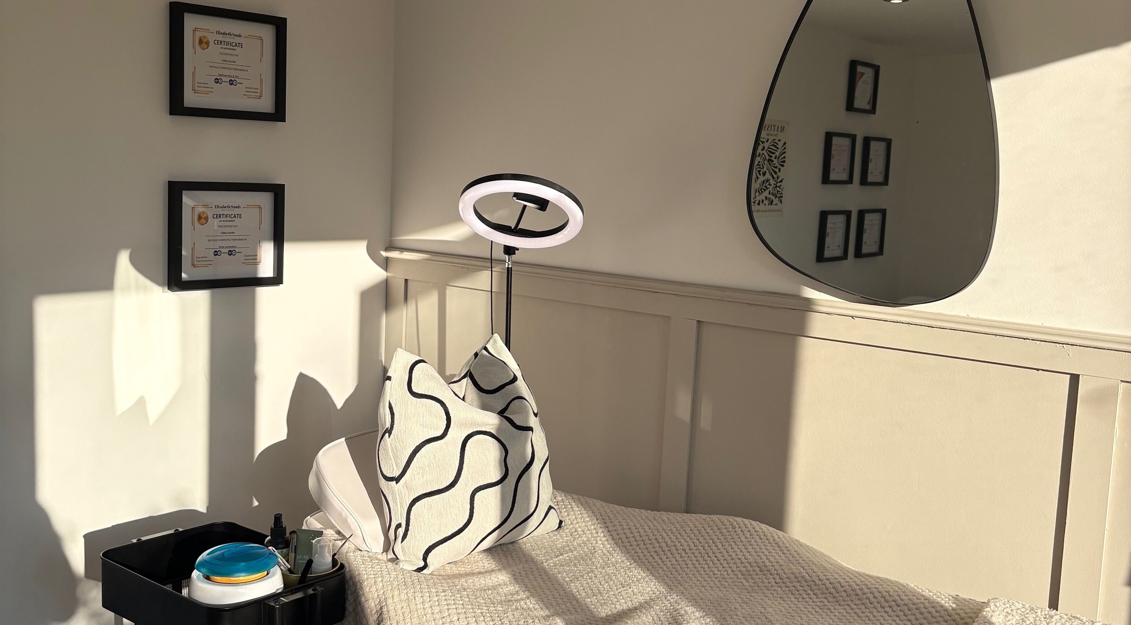 Relaxing treatment room at Polished by Libs, Beckingham, England, GB with cozy blanket and aesthetic decor.