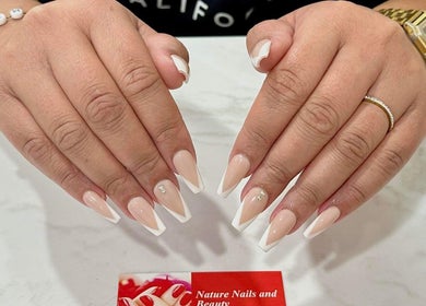 Elegant French nails with rhinestones at Nature Nails & Beauty Spa, Pukekohe, Auckland, NZ.