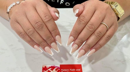 Elegant French nails with rhinestones at Nature Nails & Beauty Spa, Pukekohe, Auckland, NZ.