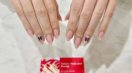 Stylish nail art at Nature Nails & Beauty Spa in Pukekohe, Auckland, NZ, showcasing intricate design and elegance.