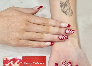 Stylish red and white nail art at Nature Nails & Beauty Spa, Pukekohe, Auckland, NZ.