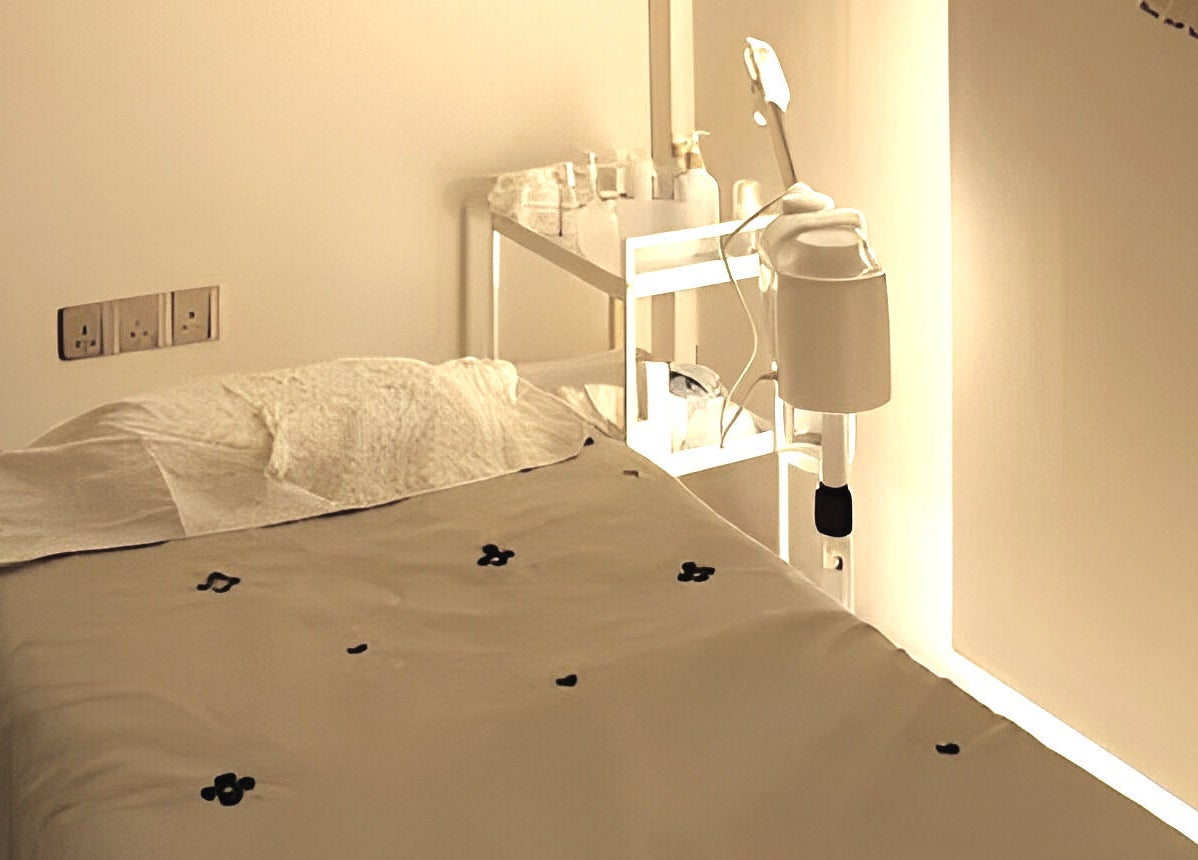 Relaxation room at Beylla Medispa Teluk Intan, TELUK INTAN, Perak, MY, with a prepared treatment bed.