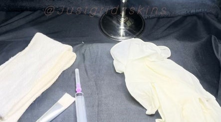 Skincare tools and gloves on display at JustGridzSkins, Pretoria, Gauteng, ZA, highlighting a professional setting.