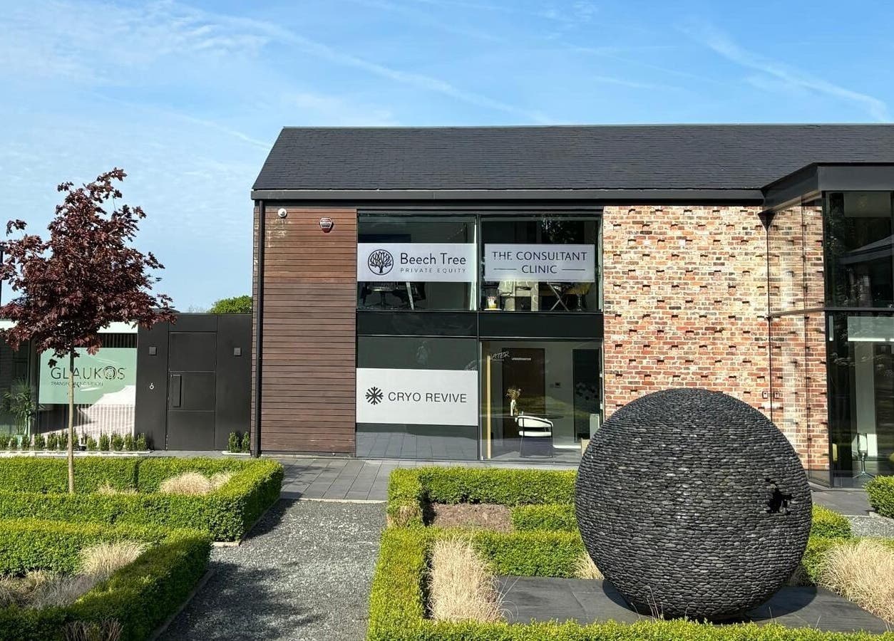 Entrance of Cryo Revive Wilmslow, a modern wellness center in Wilmslow, England, GB, showcasing contemporary architecture.