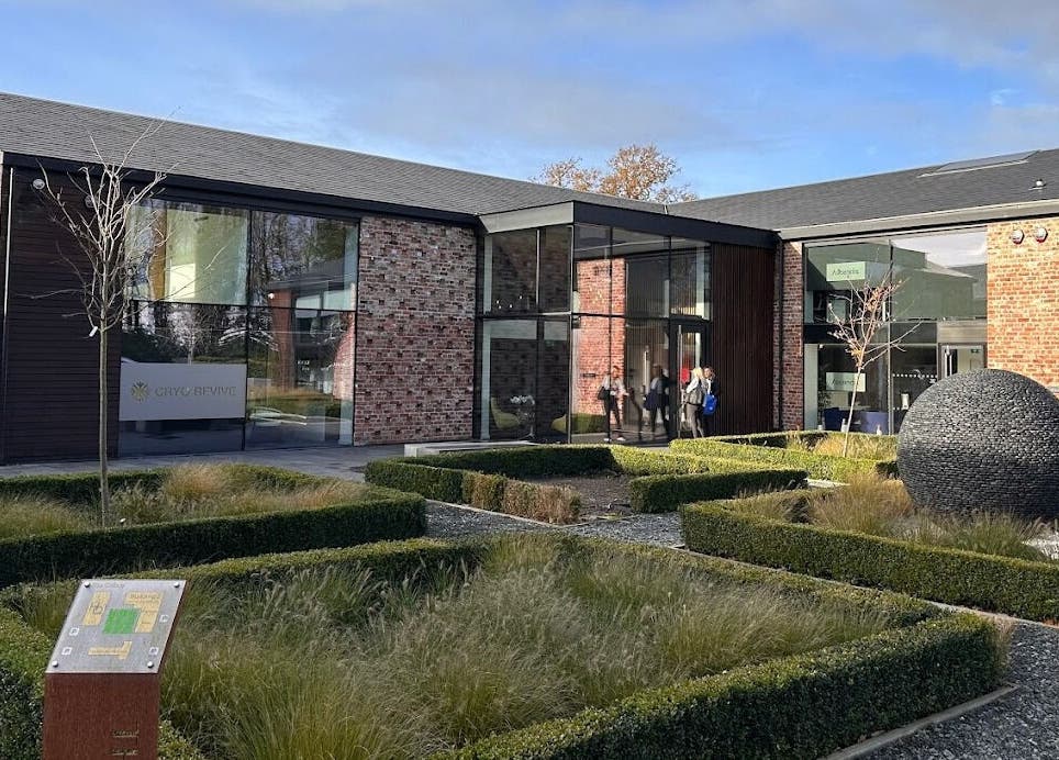 Exterior of Cryo Revive Wilmslow, a modern wellness venue in Wilmslow, England, GB featuring glass and brick design.