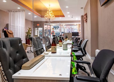 Chic nail stations at Fresh Nails & Spa, Glen Ellyn, Illinois, US, showcasing luxury and comfort.