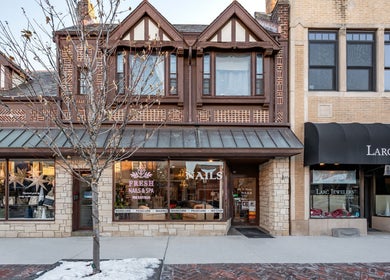Front view of Fresh Nails & Spa in a charming building on Main St, Glen Ellyn, Illinois, US.