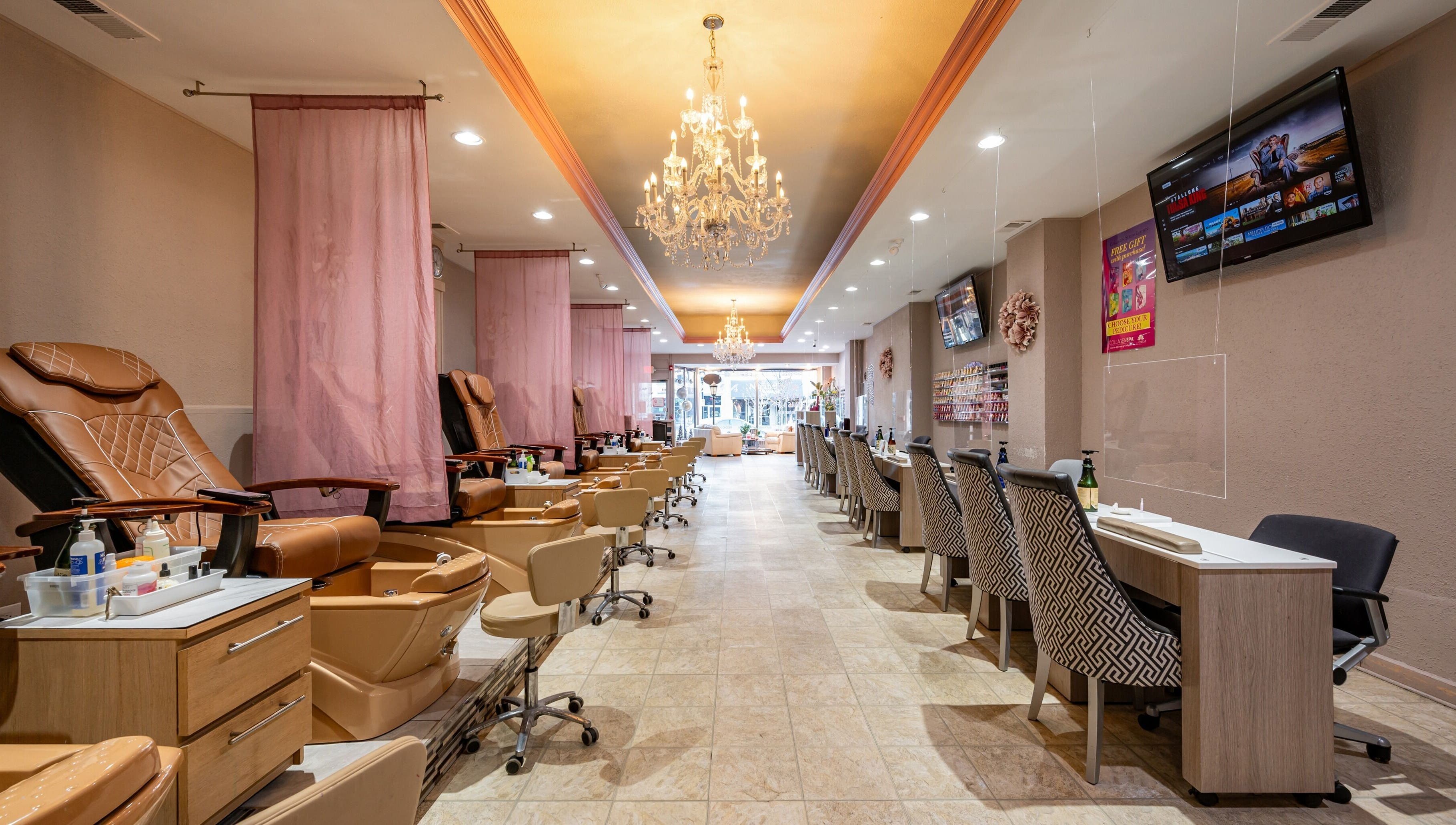 Luxurious interior of Fresh Nails & Spa in Glen Ellyn, Illinois, US with elegant seating and chandeliers.
