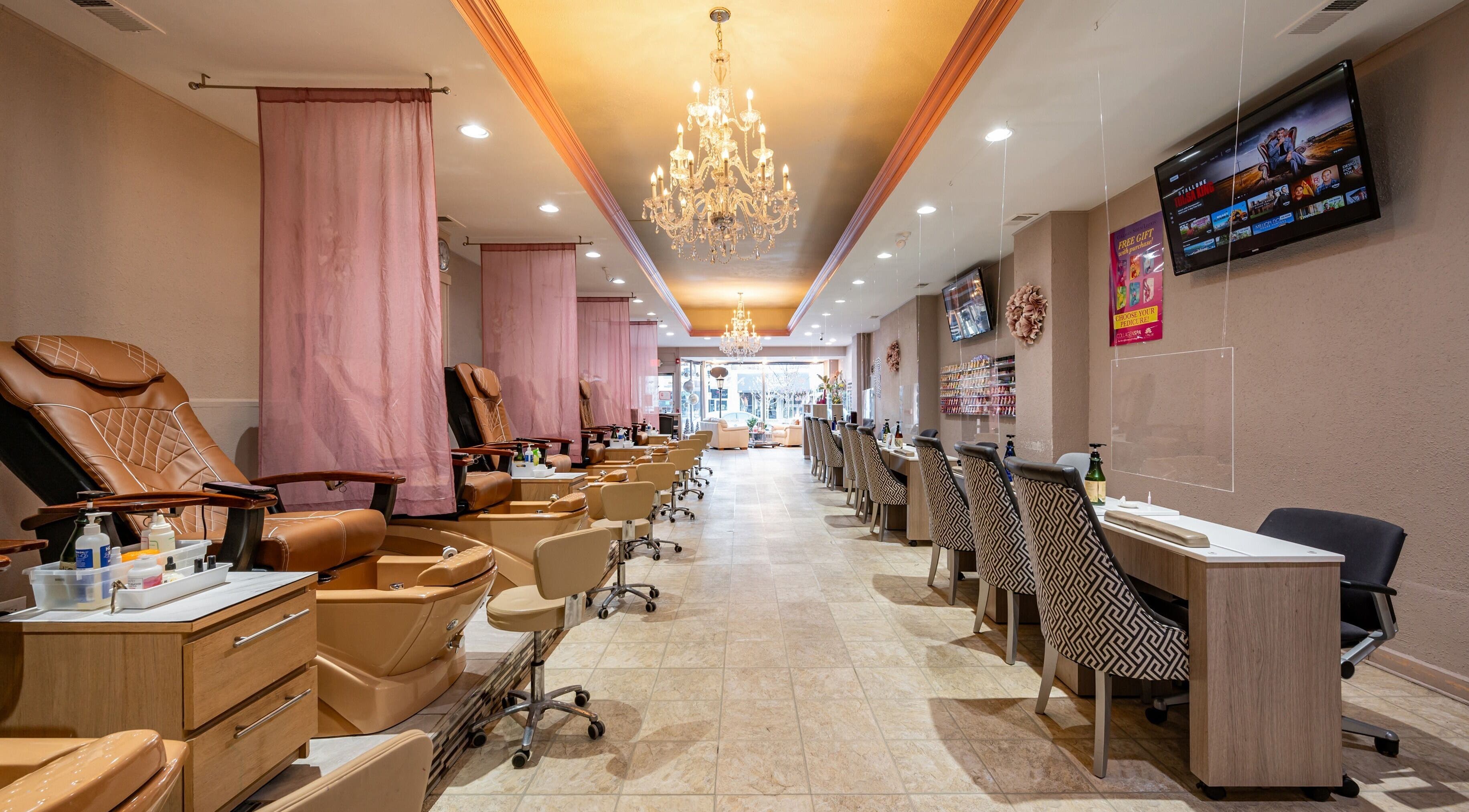 Luxurious interior of Fresh Nails & Spa in Glen Ellyn, Illinois, US with elegant seating and chandeliers.