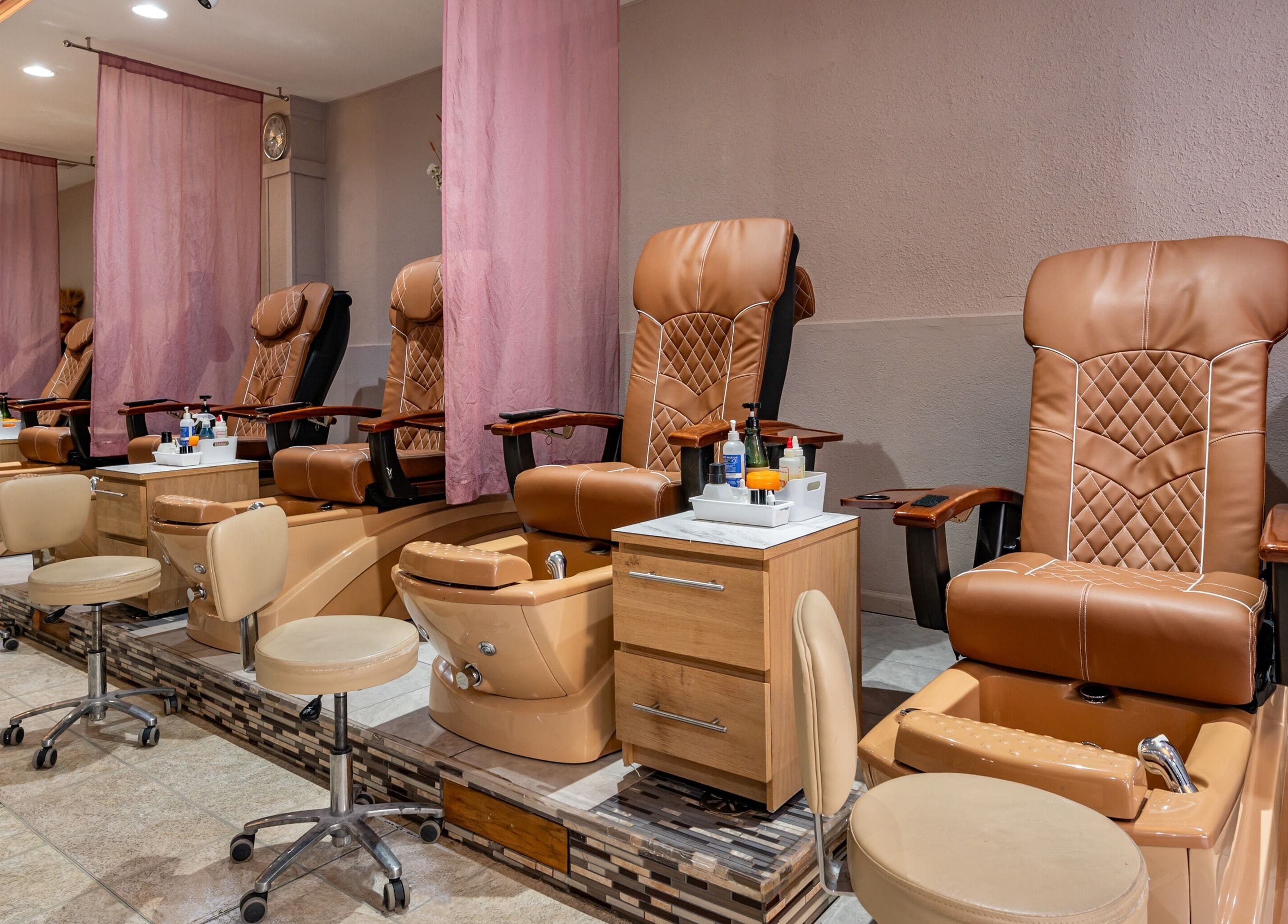 Luxurious pedicure chairs at Fresh Nails & Spa in Glen Ellyn, Illinois, US offer a relaxing experience.